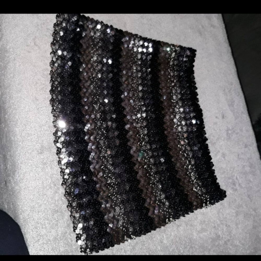 2 sequined clothes, both for 15